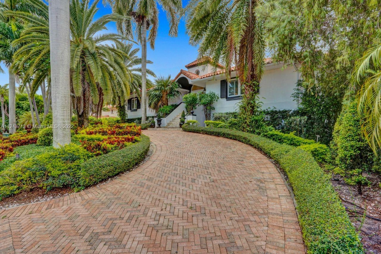 Elegant Two-story, very private 5 bedroom 4.5 bathroom Waterfront home in highly desirable Gables By The Sea. (NO OCEAN ACCESS). Living area is LARGER THAN TAX ROLL as per owner. 4,642 adj. SqFt and 7,557 total SqFt. Upstairs features remodeled kitchen w/SS high end appliances, Pneumatic vacuum Elevator, 4 Large bedrooms including large Master suite. Downstairs features a Bonus area that can be utilized as an in-laws quarters or teenager living area w/full bath. Currently set as 10 seat theatre room, office/library room, a separate billiard room and storage. Heated pool, Huge covered terrace, Tiki hut, koi pond with waterfall, four car garage and plenty of parking and very private with No back or front neighbors. Fantastic for entertaining. Highest rated private and public schools nearby.