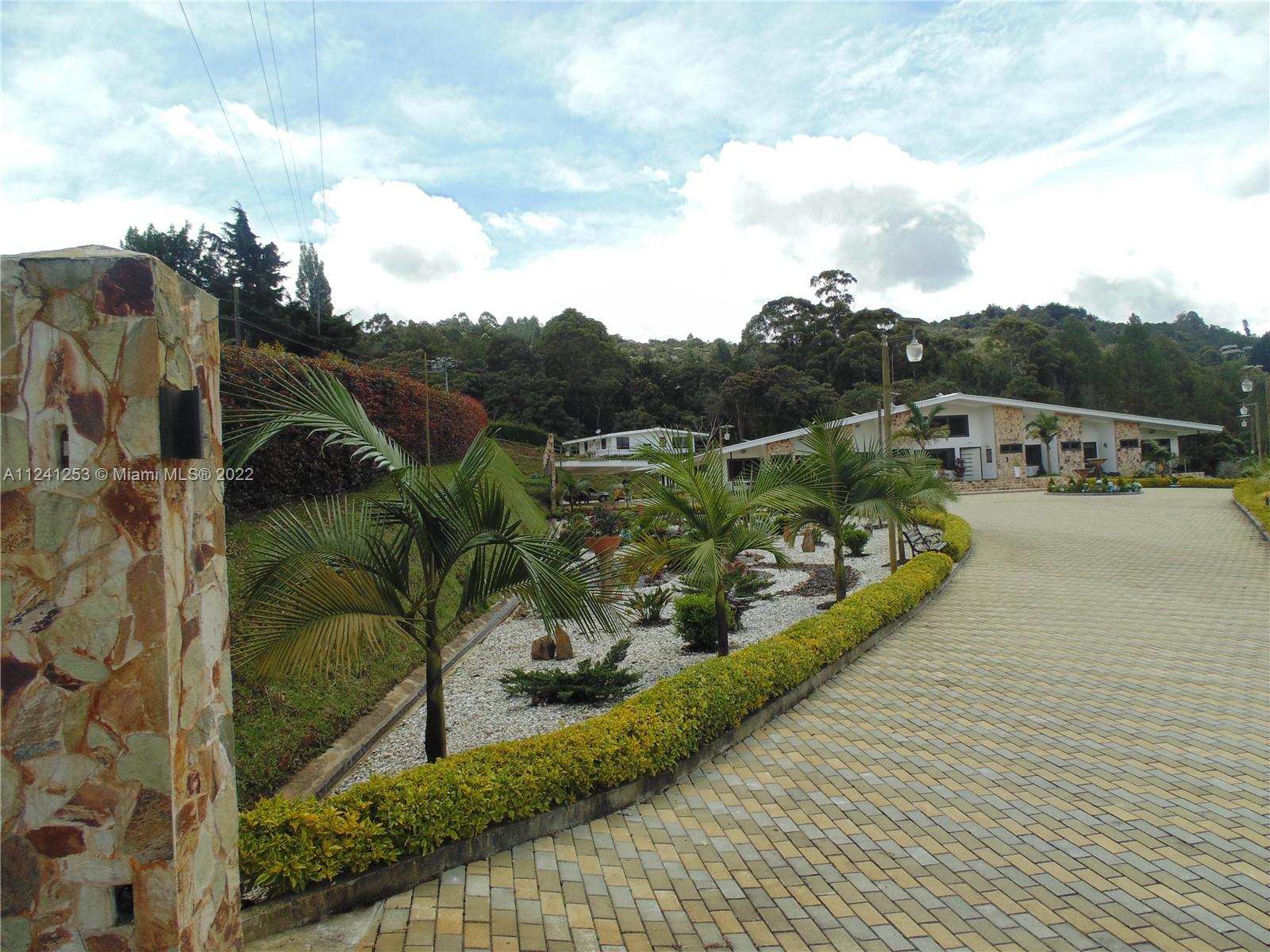 View of Main House and Guest House on farther left (Top Mountain)