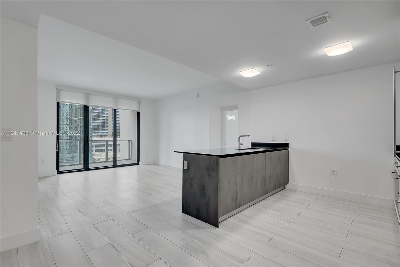 Enjoy the comfort of living in this spacious 2 BR + 3 BA + DEN that features an in-unit private elevator, 9-ft high ceilings, & floor-to-ceiling windows. 2 showers + 1 bathtub. In-unit W/D. Enjoy the skyline & partial bay views from the two in-unit balconies. 1010 BRICKELL is among the most amenitized buildings in Miami: rooftop pool & lounge, indoor poor, outdoor running/walking track, fitness center, indoor basketball/racquetball courts, kids playroom, gameroom, virtual golf, BBQ area, & spa. Located in the heart of Brickell within walking distance to the Metromover (public transportation), restaurant & shops, Brickell City Centre, & Mary Brickell Village. Short drive to Miami Beach, Key Biscayne, Coconut Grove, Downtown Miami, Wynwood/Midtown, & Design District.
