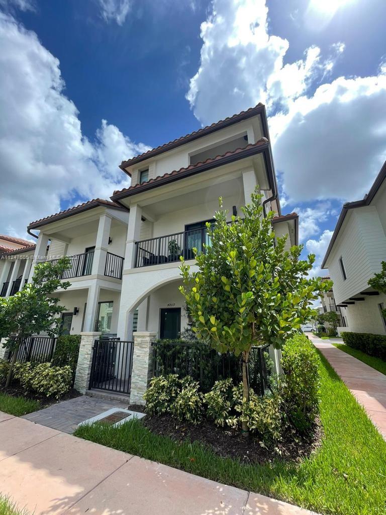 Beautiful 3 story corner townhome located in the desirable Downtown Doral. With 4 bedrooms 2 full bathrooms 2 half bathrooms and 2 covered car garage.The social area is located on the first floor, the rooms on the second and a beautiful terrace on the third floor, where you can enjoy moments with family, friends and countless sunsets. This great community offers incredible amenities for the whole family including: Clubhouse, Fitness Center, Pool and much more. A few minutes walk from restaurants, supermarkets, schools, and other entertainment options.