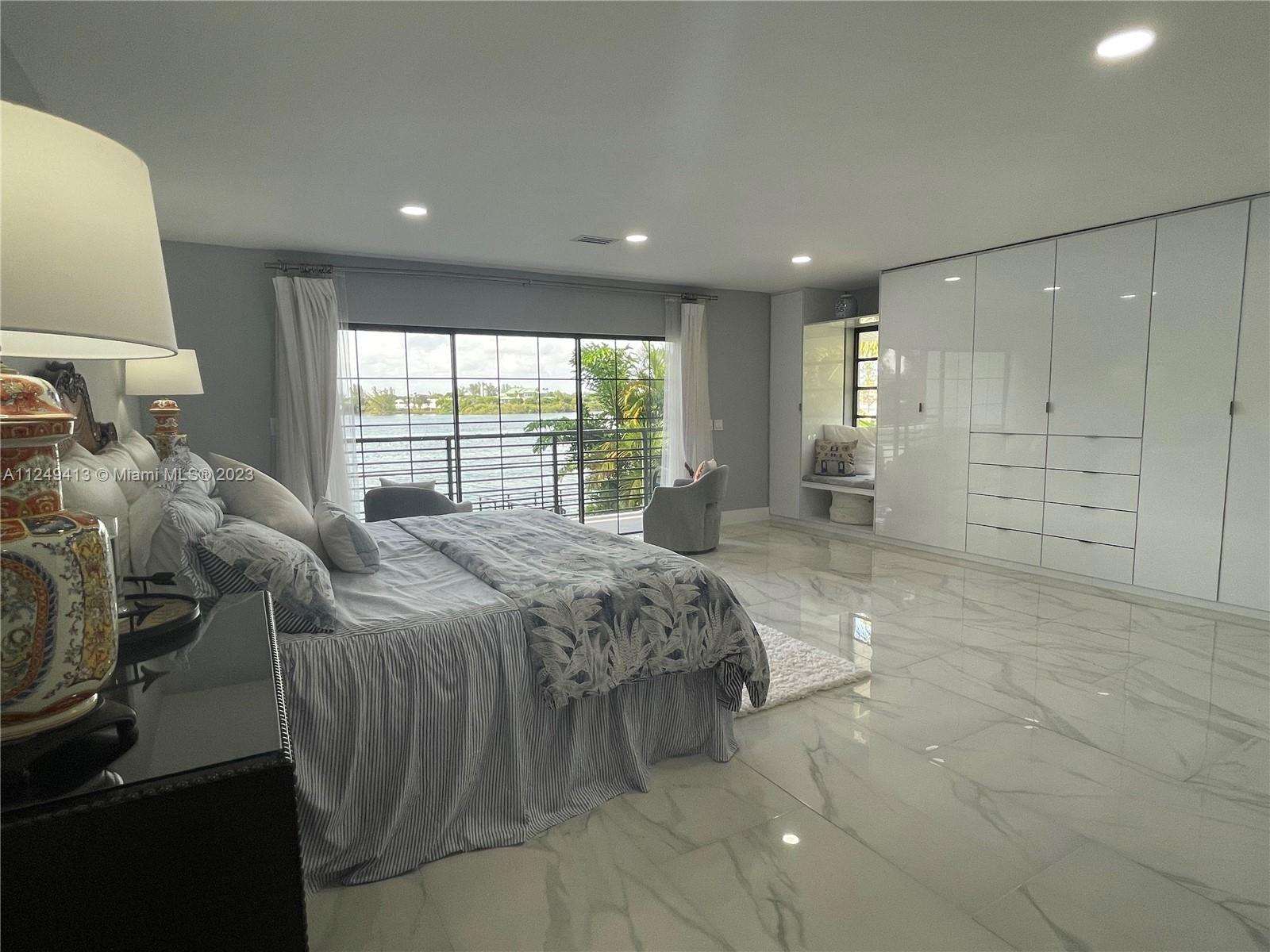 master bedroom with balcony