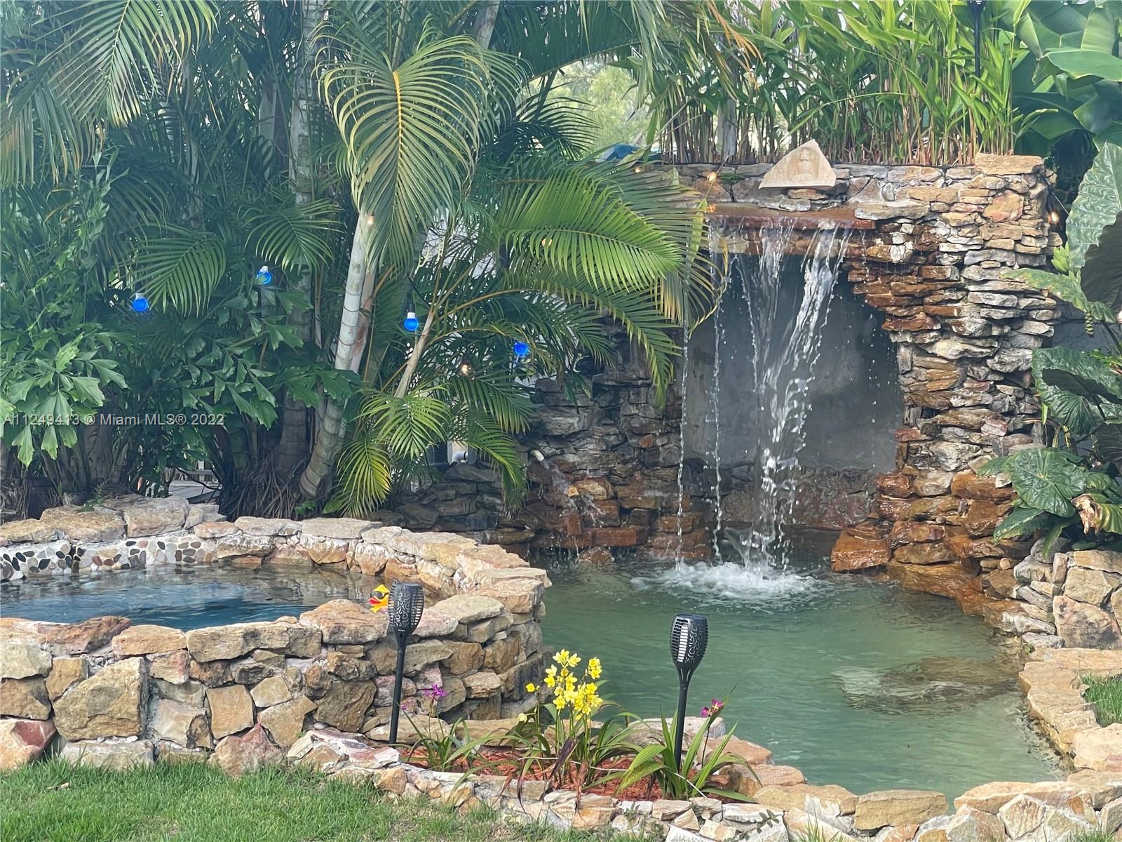 Waterfall plunge pool with Hotub and Grotto