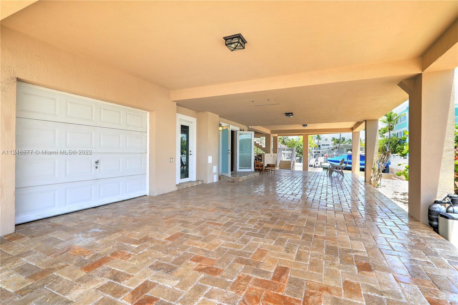 Carport & storage with pavers