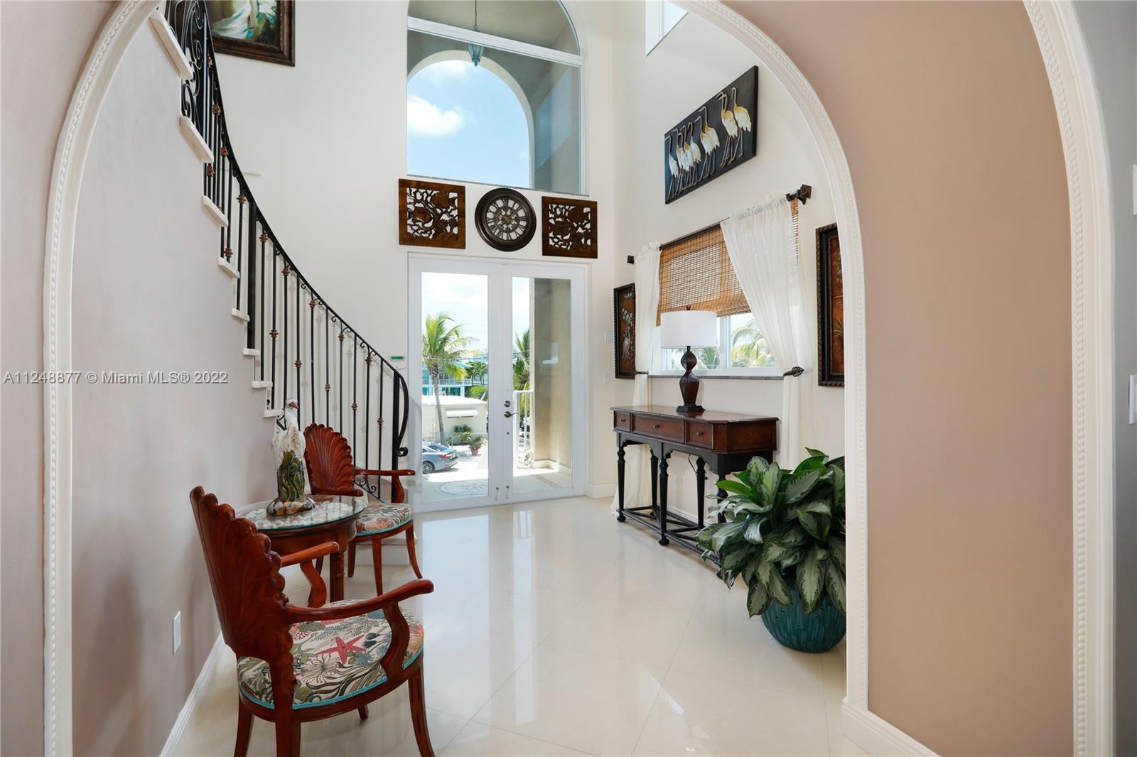 Interior staircase access to 3rd Floor and Sundeck.