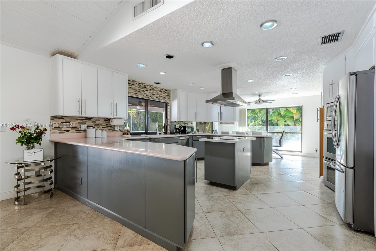 Garden View Formal Dining Area with designer table and basking in natural light