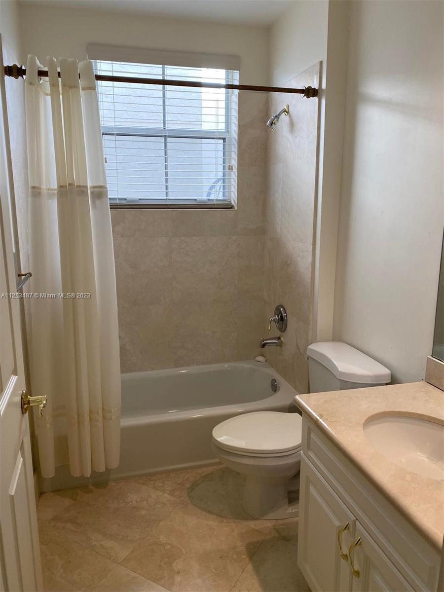 Downstairs bathroom with full bath