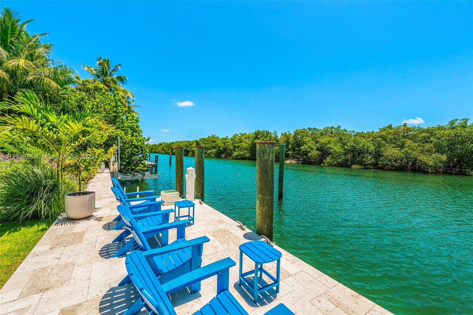 THE FINEST OF NEW WATERFRONT LIVING. 6 BEDROOMS AND 6 BATHS AND 2 HALF BATHS IN OVER 10,000 SQUARE FEET ON THE PINES CANAL LOT OF 18,600 SQUARE FEET. CUSTOM BUILT IN 2018 WITH ALL THE CUSTOM UPGRADES YOU CAN THINK OF, INCLUDING A 15,000 CAPACITY BOAT LIFT, A PRIVATE DOCK, FULL HOUSE 110K W GENERATOR WITH AUTOMATIC TRANSFER SWITCH, CONTROL4 SMART HOME SYSTEM, CONCRETE ROOF, HIGH CEILINGS, ITALKRAFT KITCHEN WITH HIGH END APPLIANCES FEATURING INDUCTION AND GAS AND 4 OVENS AND A FULL ITALKRAFT CATERING /PREP KITCHEN, WINE CELLAR, TWO ITALKRAFT LAUNDRY ROOMS (ONE UPSTAIRS, ONE DOWNSTAIRS), TWO COVERED PATIOS WITH AUTOMATIC SCREENS, HOME IS ELEVATOR READY, LARGE GARAGE WITH AC AND SEPARATE GOLF CART GARAGE, CENTRAL VACUUM SYSTEM, FULL HOUSE ELECTRICAL THROUGH CONDUIT, AND SO MUCH MORE.