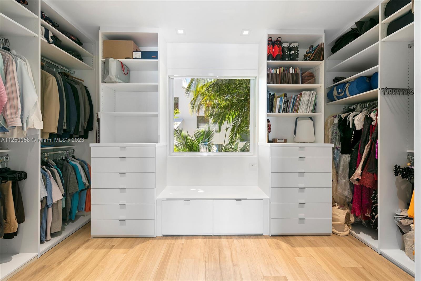 ONE OF THE CUSTOM MASTER CLOSETS