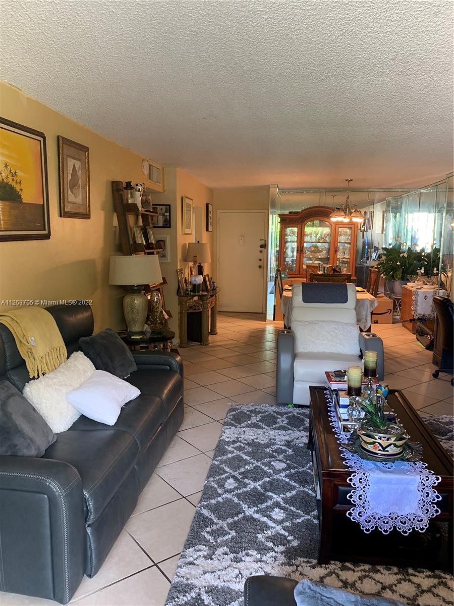 LIVING ROOM AND DINING ROOM TILE FLOORS