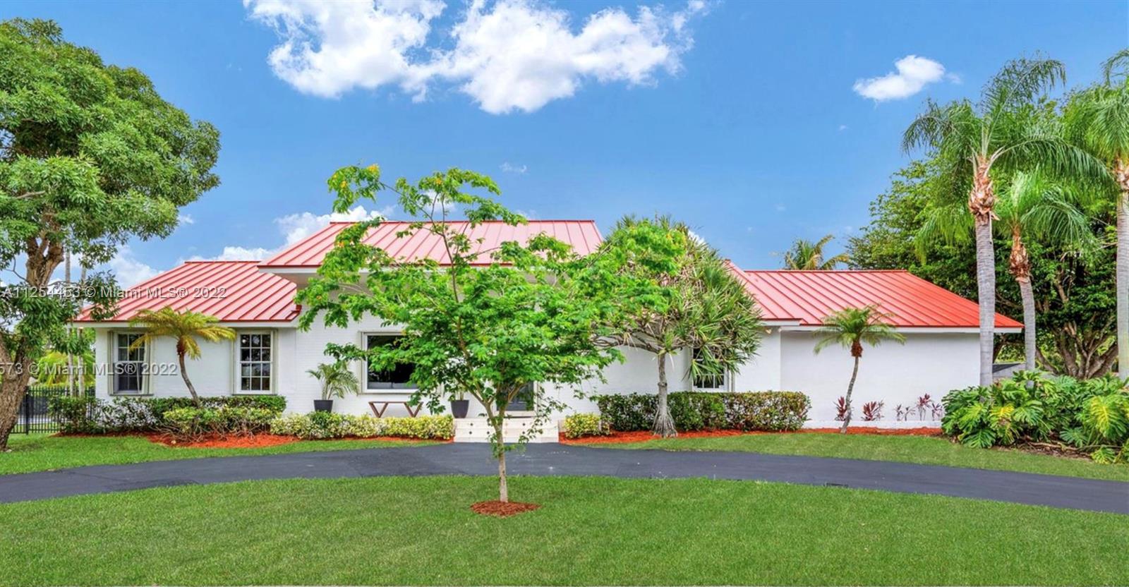 Beautiful house in Palmetto Bay.  High ceilings, hurricane shutters, marble floors, 3/2 split  bedroom plus den and separate living, dining and family.   This is a quiet neighborhood with great public and private schools.