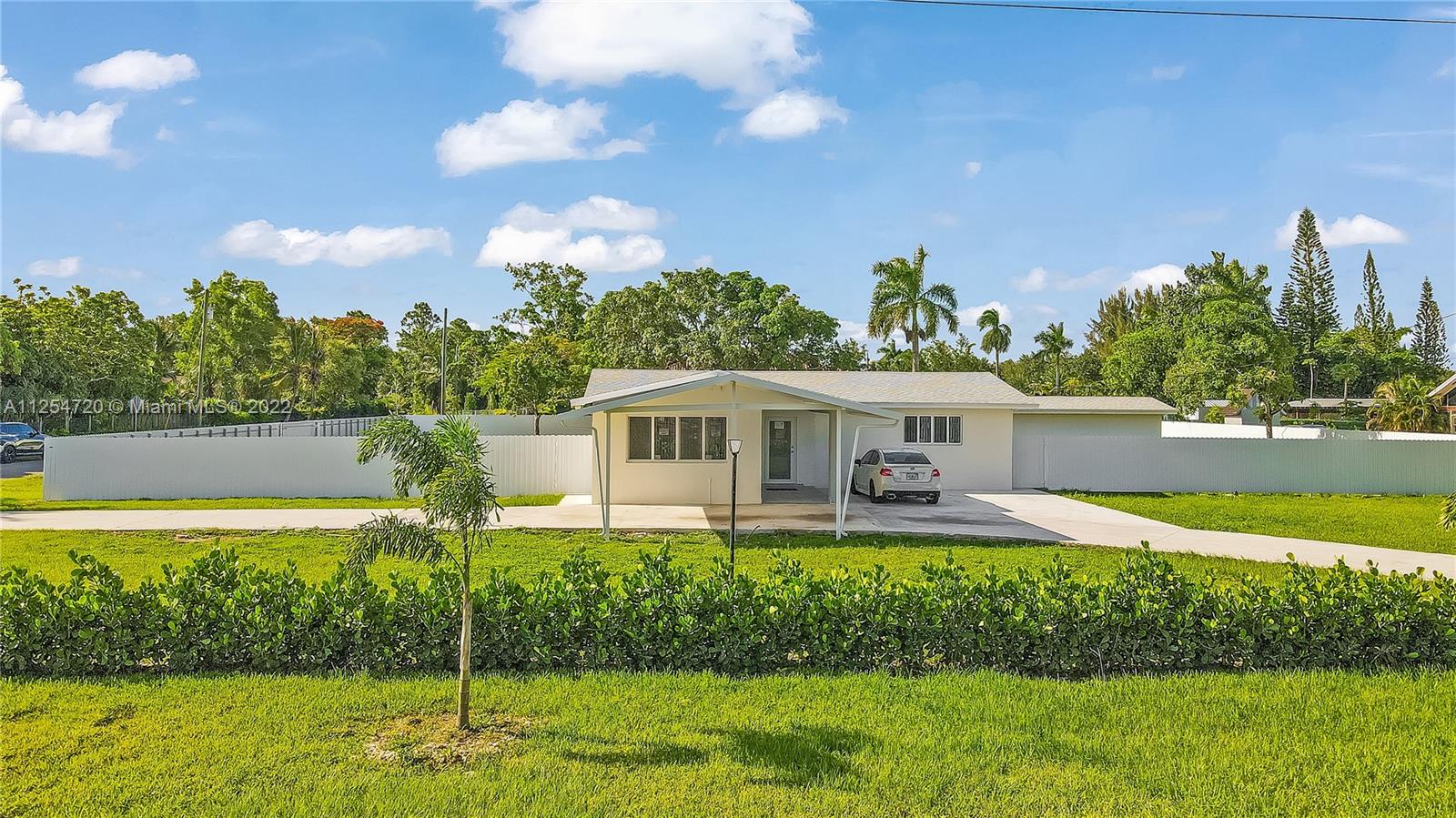 Move in ready! Located in the heart of Redland. Close to Krome Ave, schools and shopping centers. It is a 3/2 with Florida room (can be used as an extra room) with over a half of acre of land at your disposable. Can park Boats and RV's. Owner has renovated over $200,000. Optional it can be rented with furniture. Easy to show. The property in the back of the single family home is currently under renovations and will be rented separately.