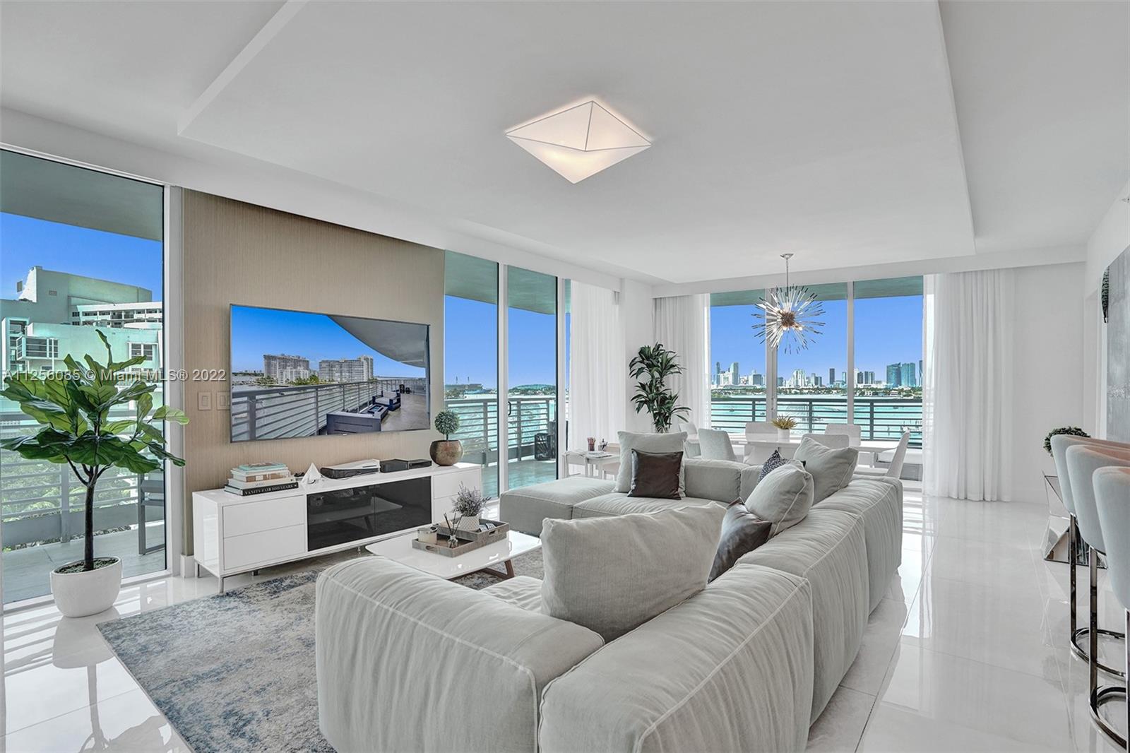 Beautifully and fully remodeled  3/3 at the Capri South Beach, a luxury boutique building sitting on the bay.  This very special and spacious apartment has some of the best Direct Bay and skyline views from every room! Beautiful light, stunning renovations and top of the line appliances. Enjoy our magnificent Miami sunsets from a large wrap-around terrace or a second terrace off the master. Elegant and charming, Capri offers exceptional service and a wonderful lifestyle with a concierge, valet, fitness center, pool, jacuzzi, on site management and a private marina.  Boat slips, up to 30ft, available for sale.  Located on a quiet cul-de-sac but just a few blocks from Sunset Harbour, Lincoln Road, great restaurants and fitness clubs – a truly terrific location.