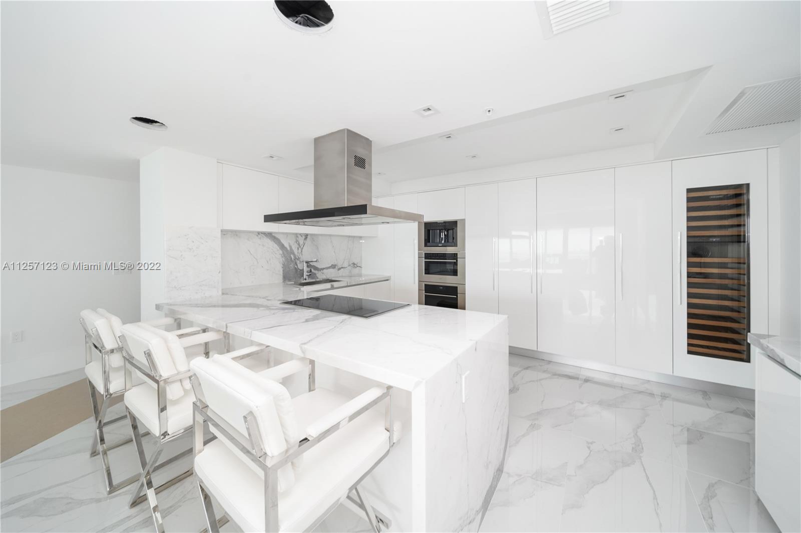 Fully upgrade combination unit with 4 bedrooms, 4.5 bathrooms and a beautiful view of the Intercostal waterway and sunny sky line. Enjoy a open concept layout with a large balcony with sunset and sunrise views. Marble counter top and wolf appliances in the unit! This is a must see! SELLER FINANCING AVAILABLE SUBJECT TO SELLER APPROVAL. Guest suites are available for owner’s guests,5-star luxury amenities including concierge,24-hour security & valet, State-of-the-art bio-metric access control, Resort-Style Infinity-Edge Pool & Resistance Pool, Poolside Bar & Bistro, Poolside Cabanas, Private Cinema & Game Room, Spa & Fitness Center, Hotel Style Guest Suites, Cigar Lounge, Wine Room, Club Room, Kids Club & pool