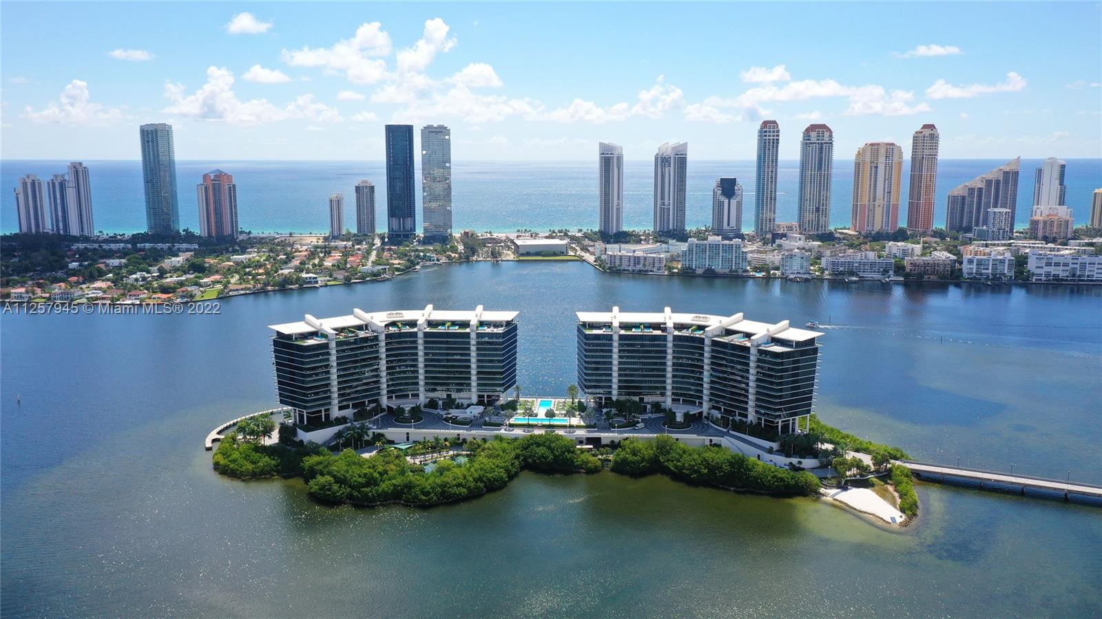 VIEWS GALORE! Welcome to this spectacular waterfront residence #707N at the one of a kind PRIVE CONDOMINIUM, a secluded boaters’ paradise enclave phenomenally situated on an eight-acre private island surrounded by water, fresh air and sunshine, offering an exclusive, fabulous lifestyle with and an array of world class services and amenities and private marina with available slips for purchase. This amazing EAST/WEST flow through unit features direct, unobstructed ocean, intracoastal and city views, a private foyer, 2 elevators, two expansive terraces, a built-in outdoor summer kitchen with breathtaking water views, 10 foot ceilings, stunning finishes such as beautiful european kitchen and bathrooms, gorgeous imported porcelain floors, Hunter Douglas motorized window treatments throughout.