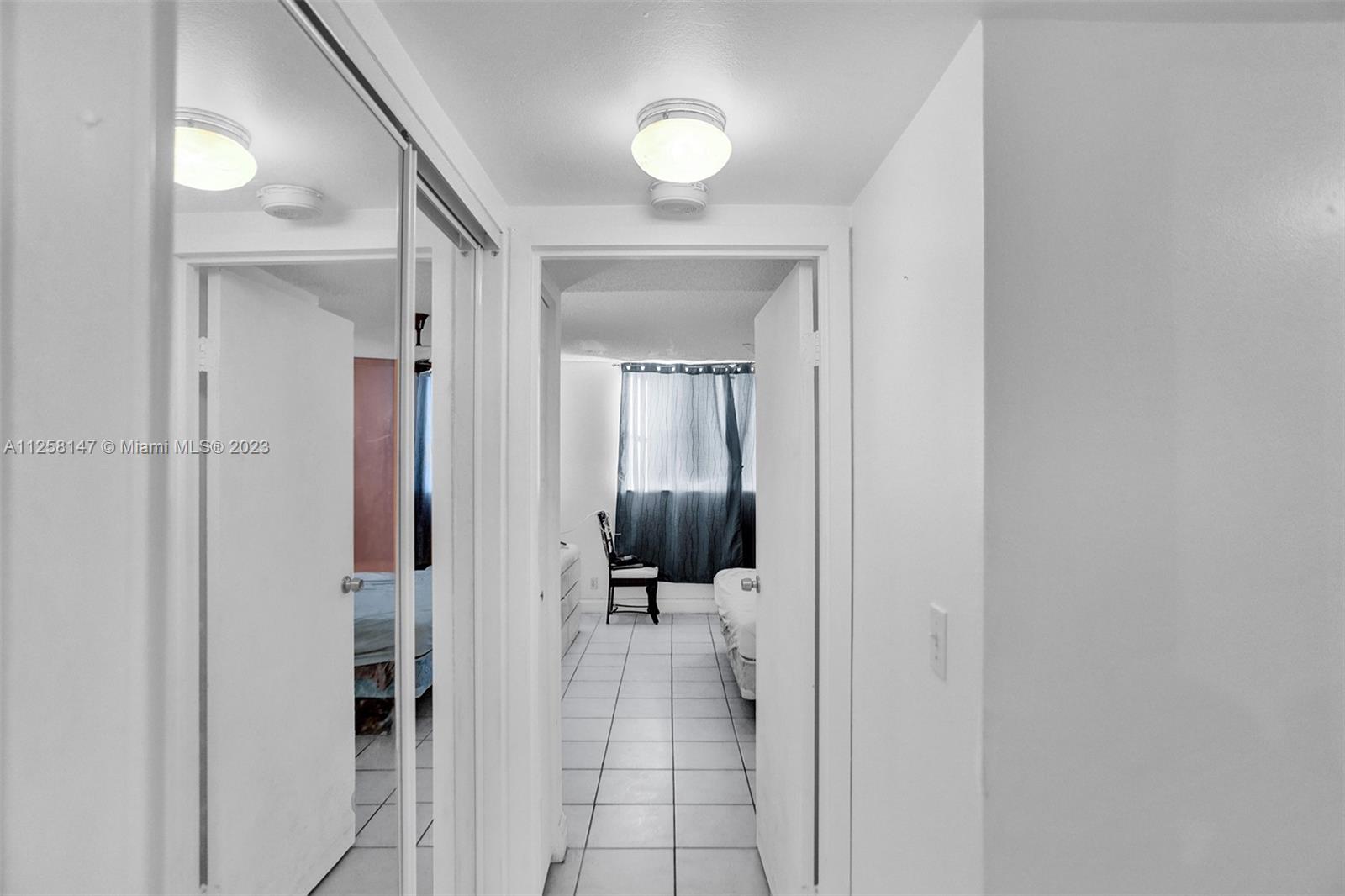 Hallway closets leading to Main Bedroom