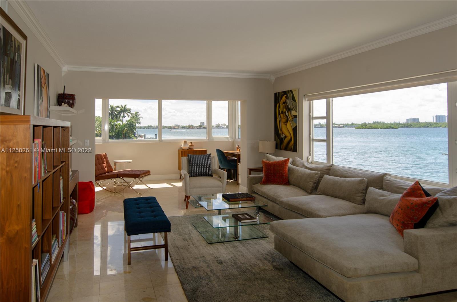 Apartment has Fabulous wide bay view from this corner unit with million $ homes at your feet across the canal while overlooking the wide bay and the yachts cruising on the Intracoastal. Feels like living on a boat. Completely remodeled including impact windows. Gorgeous state of the art kitchen with top-of-the-line stainless steel appliances. Marble floors throughout. The large pool is located right next to the dock at the end of the canal with the most beautiful view of the bay. West exposure with incredible sunsets. This is a co-op. Cash only. No rental allowed. No pets. Walk to the beach and the world-famous luxury Bal Harbor shops!
Stunning unit..
