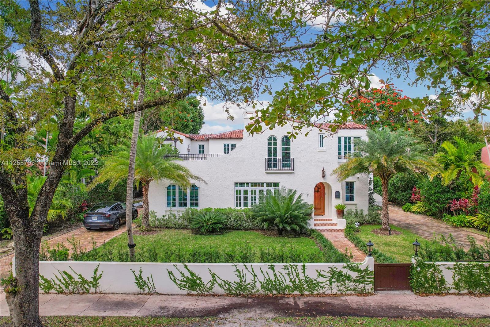 Welcome to this beautiful classical Coral Gables 5 bed property that sits on Alhambra Circle on a 15,000 square-foot lot a block away from the Granada golf course. The original home was gutted to the ground in 2020. This house remodel included an extension, a second story and a separate independent in law quarter or office. Wood floors, movie theater and a top-notch kitchen. The appliances are subzero fridge/freezer, Wolf gas range and Mile dishwasher. Sound system, security system and an elevator. Large covered BBQ and dining area, outdoor bar and lush landscaping.