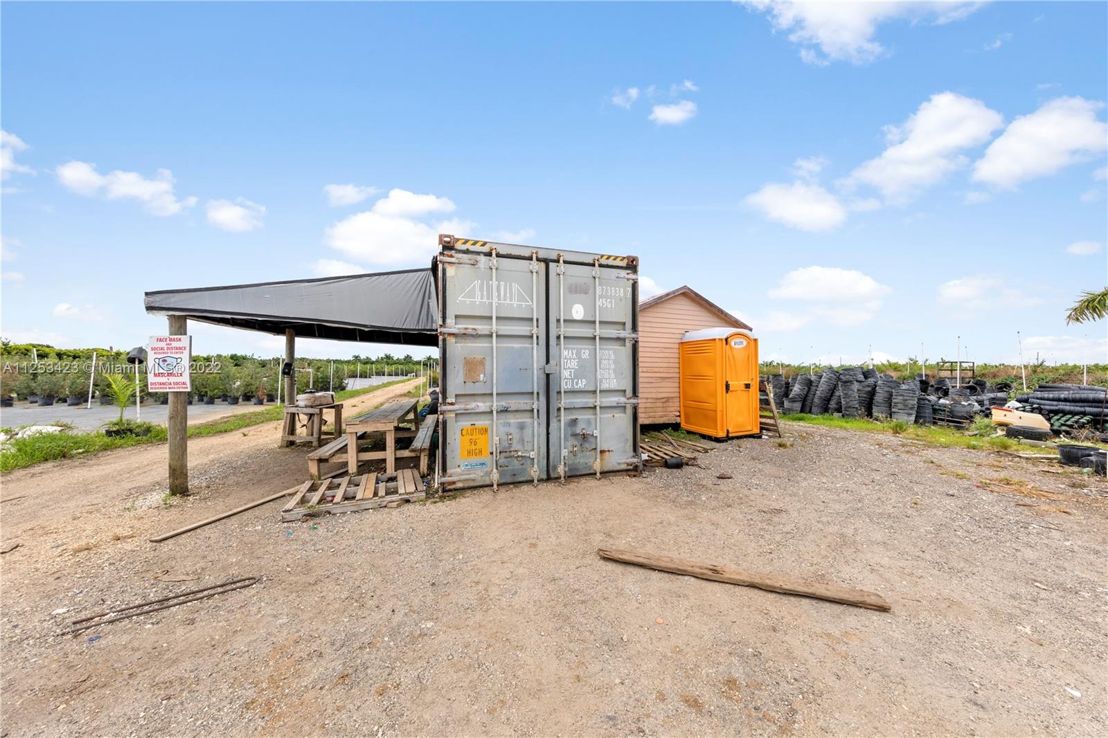 SHED/ SHIPPING CONTAINER. THIS COVERED AREA MANY EMPLOYEES PREFER TO BREAK UNDER RATHER THAN COMING UP TO SHOPS.