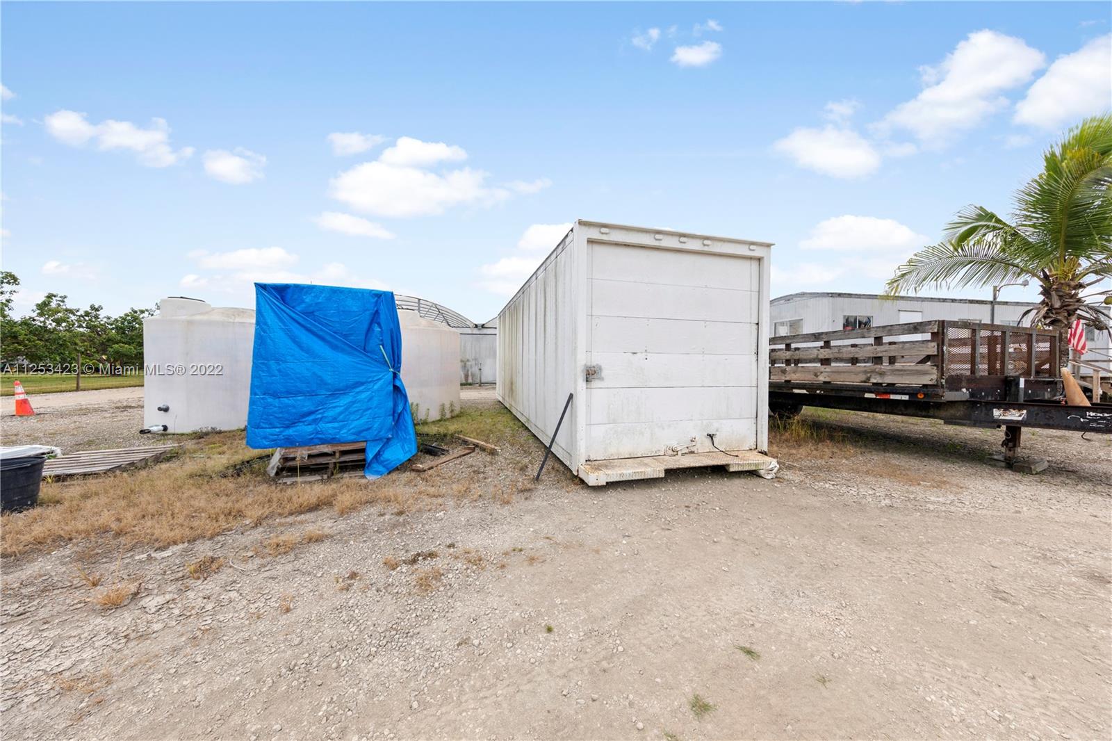  STORAGE / PARKING, 25 FOOT BEAVER TRAILRER TO HAUL NU HOLLAND OR LOAD PLANTS FOR DELIVERY (SIDE PANELS ARE REMOVEABLE)