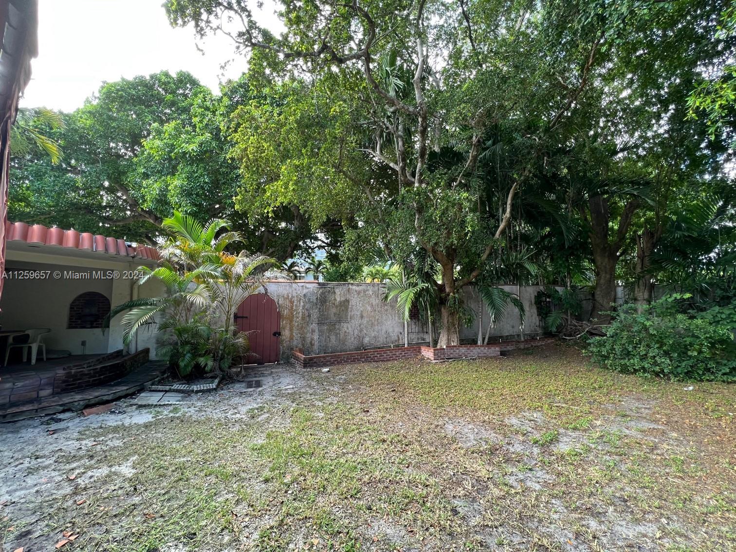 Backyard and back covered terrace