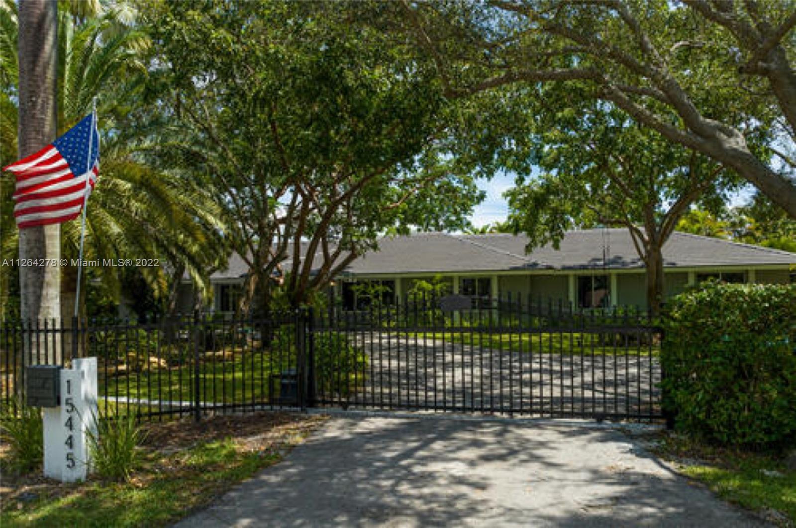 Completely remodeled by Unique Surfaces 
 in 2020. New roof in 2020. Hurricane impact windows and doors. No cast iron pipes. Mature fruit bearing and native trees throughout  the large fenced yard. Avocado, mango, carambola, banana, sapodilla, loquat, and others.  Electric gate entry. Outdoor landscape lighting. Newly resurfaced diamond brite pool. Two screened patios. Covered parking.  RV power. Nestled in an enjoyable neighborhood, and minutes from local attractions, public park. Great area schools.