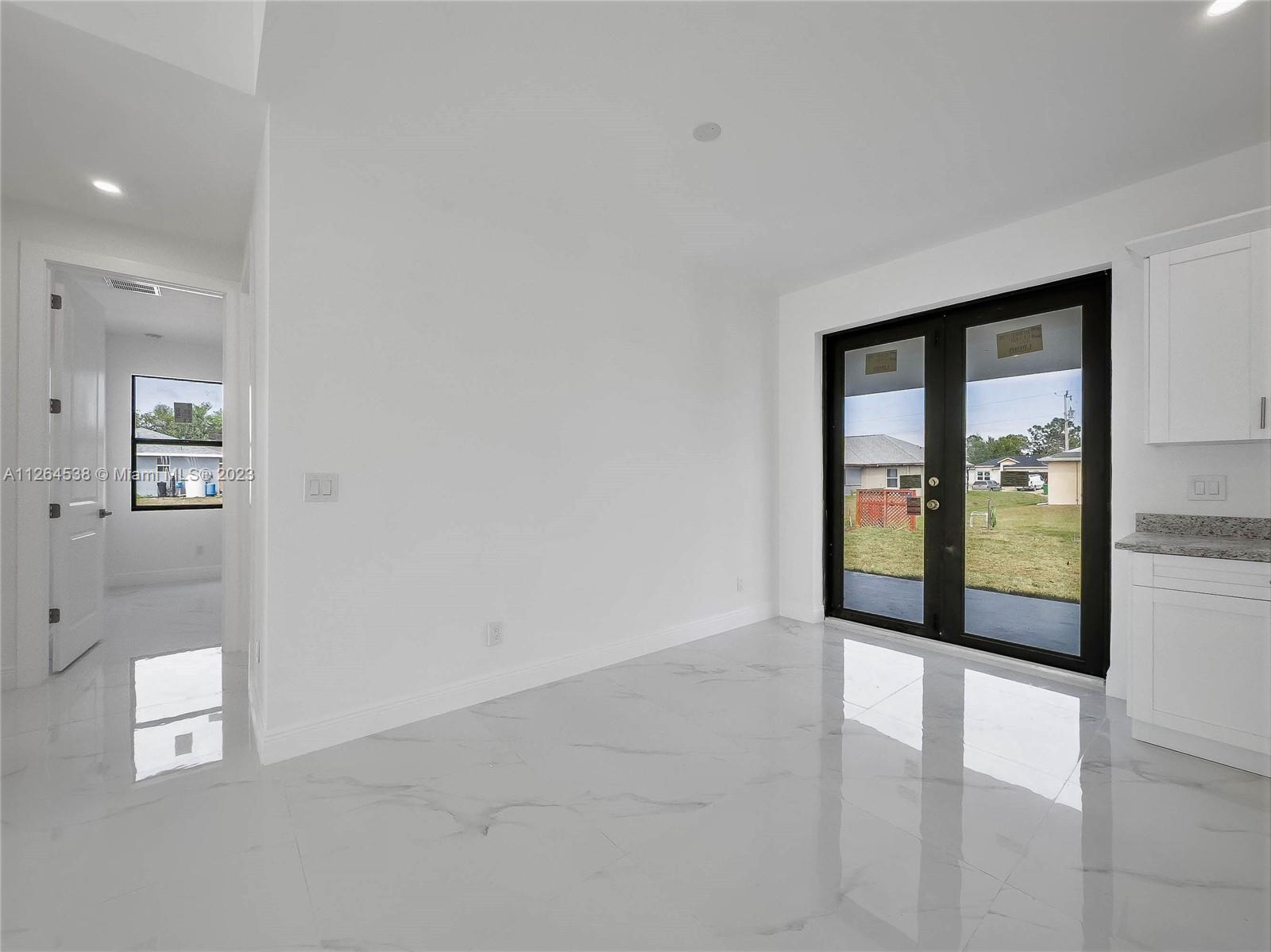 Dining area with French doors out to the Lanai