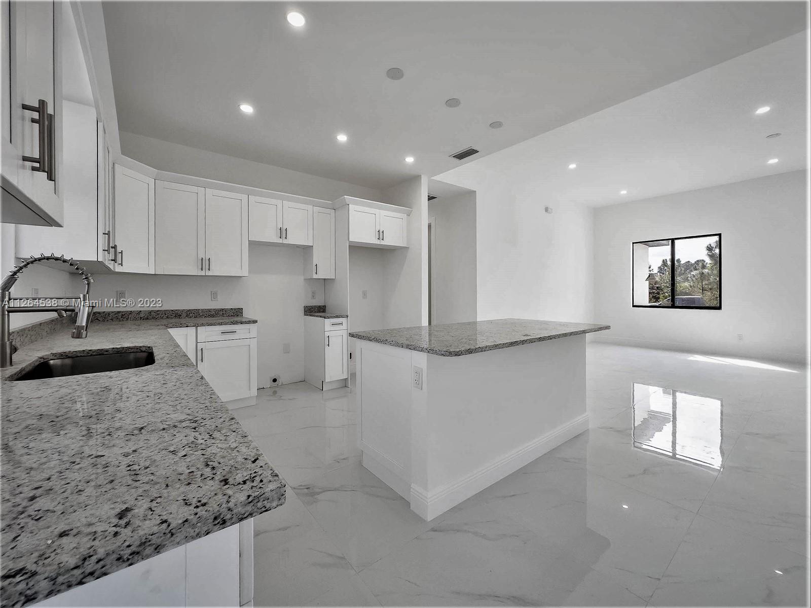 Kitchen with Shaker Style Soft Close Cabinets