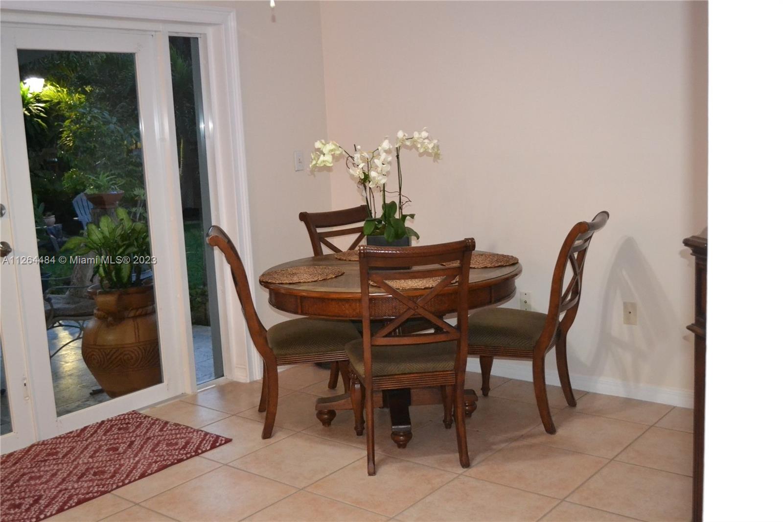 Family room used as a second dining room.