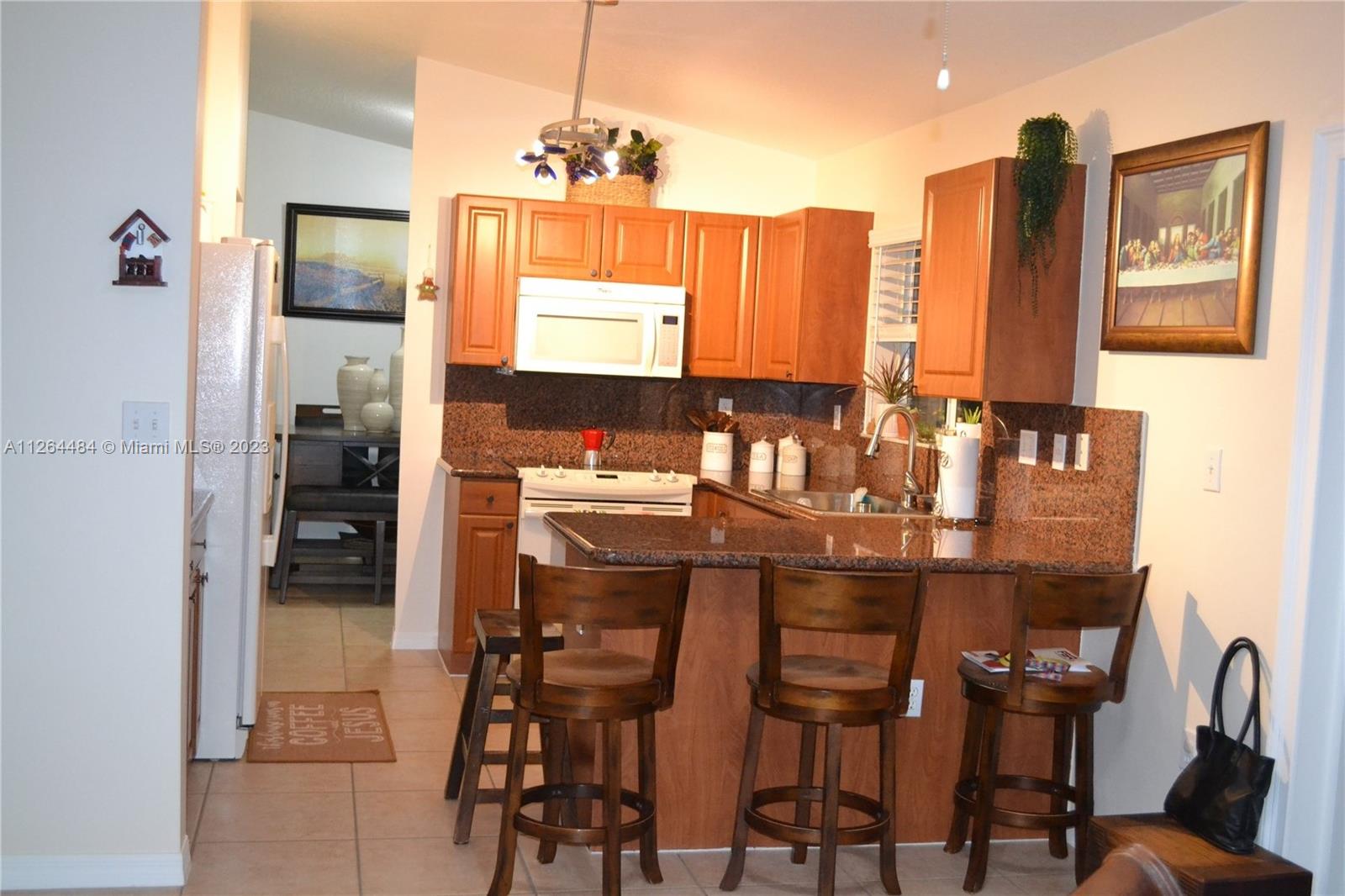 Remodeled kitchen with granite counter tops.