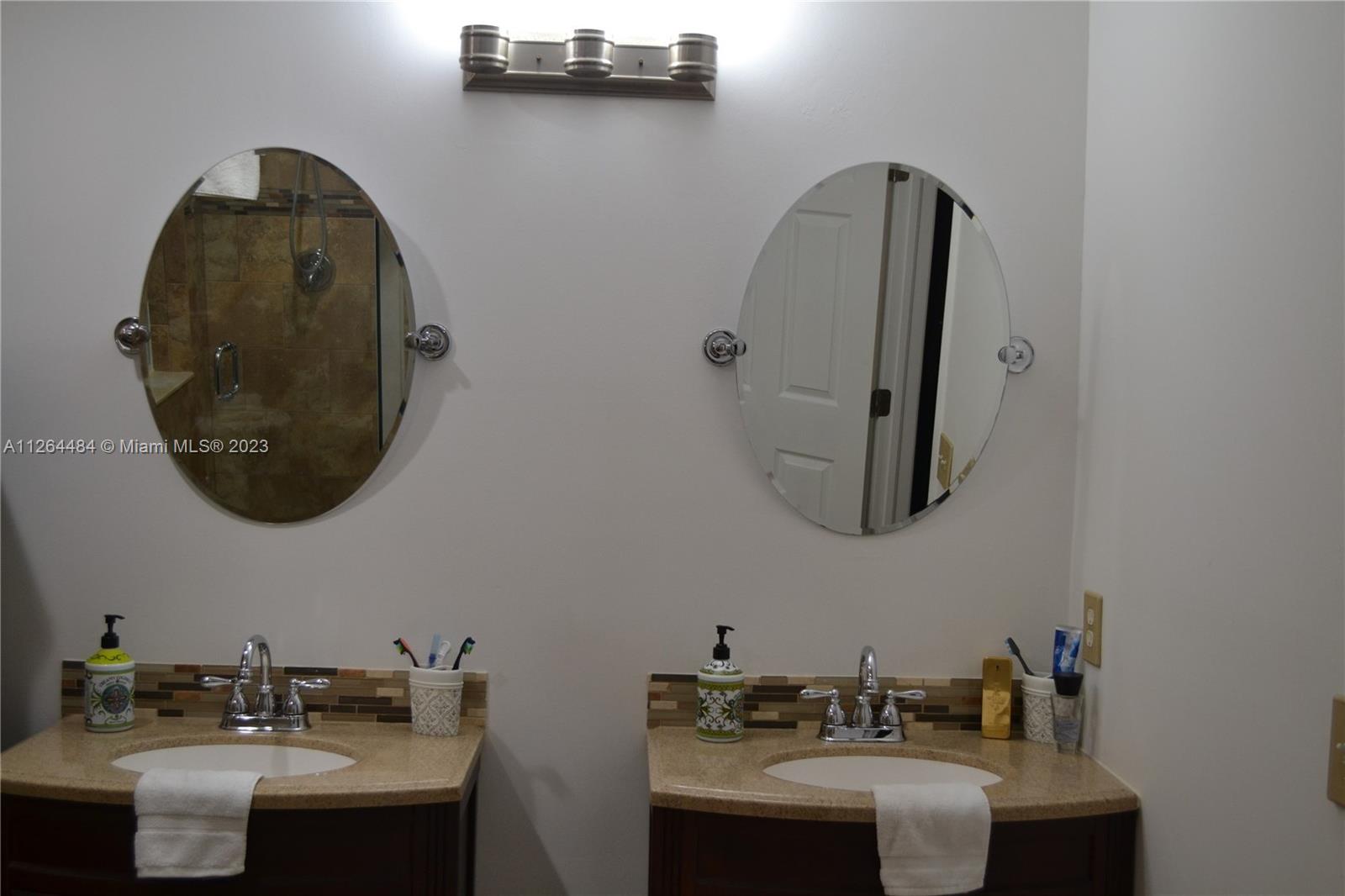 Updated master bathroom dual Sinks/Mirrors.
