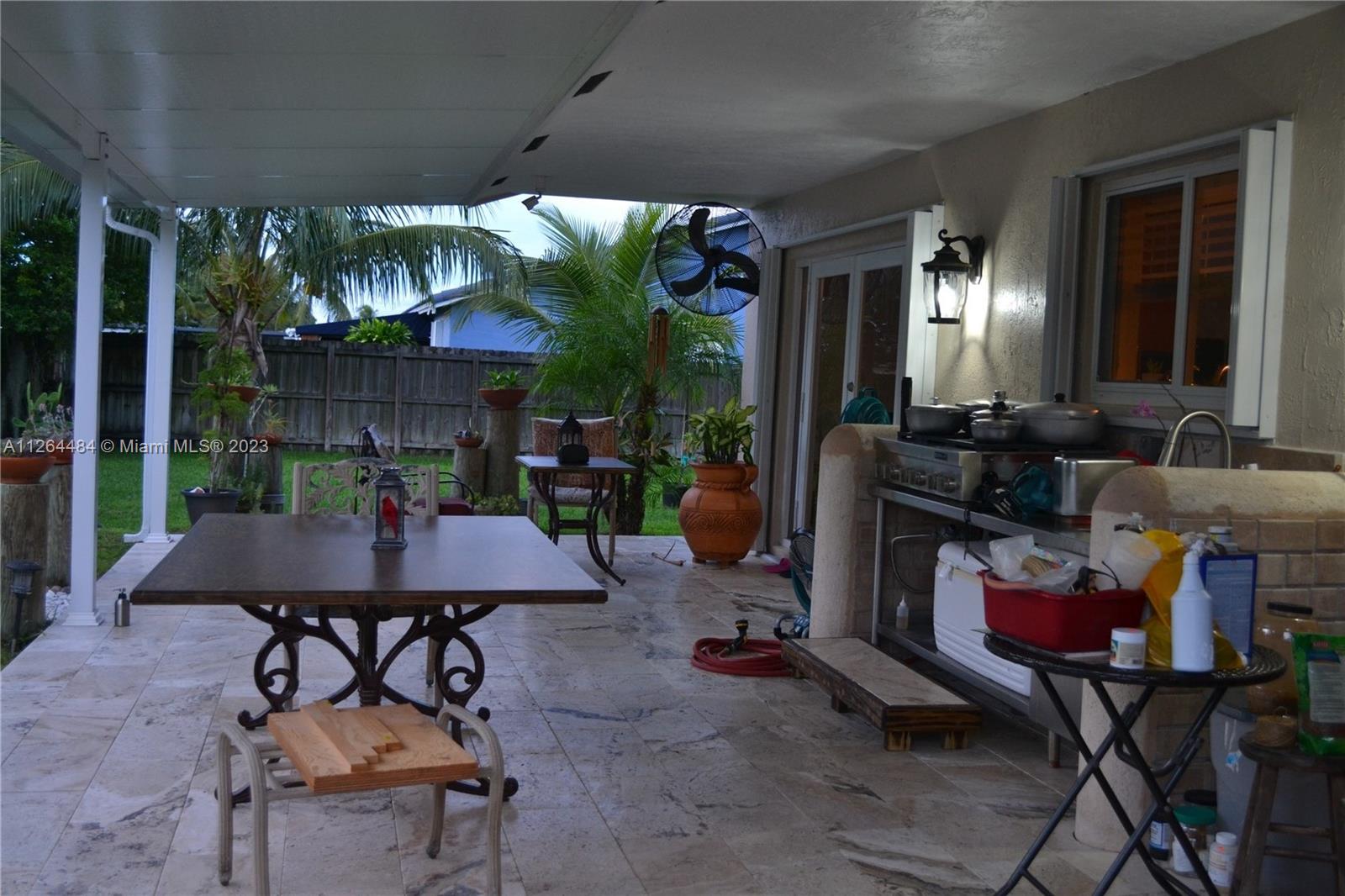 Beautiful back porch with travertine flooring.