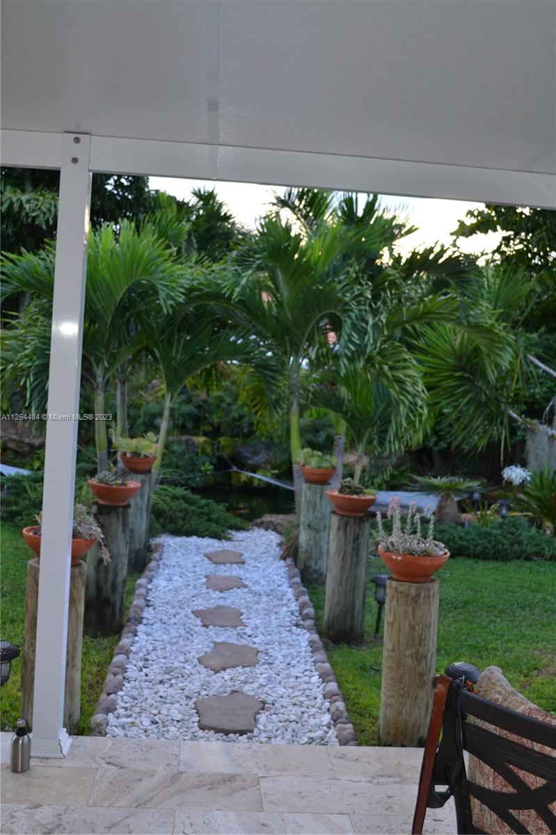 Elegant pathway to the gorgeous fishpond.