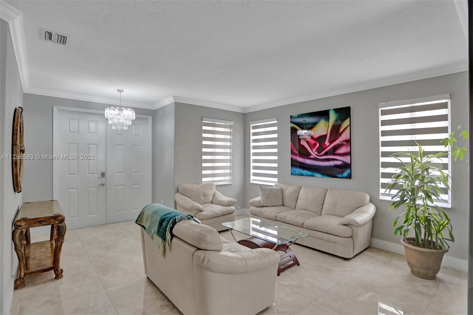 Beautiful & Unique Corner townhouse at Island at Doral.This tropical paradise is located between the Turnpike and 107th Avenue and from 74th to 90th street with a direct access ramp to the Turnpike Featuring 3 bedroom and 2 1/2 bath .Gorgeous Open layout with large living area and plenty of closet space, with two garage an laundry. Paved patio with a pergola to enjoy family time. This is a desirable gated community with amenities included such as fitness center, swimming pool and gym. Call me for an appointment.