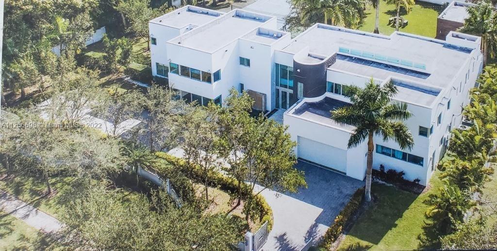 Resort Style, Two story custom home, impact windows. Tennis court and covered terrace. AS-IS contract, buyer to complete due diligence prior to submitting offer.  Property needs some finishing.  all violations, citation, liens and/or open permit to be assumed by the buyer.