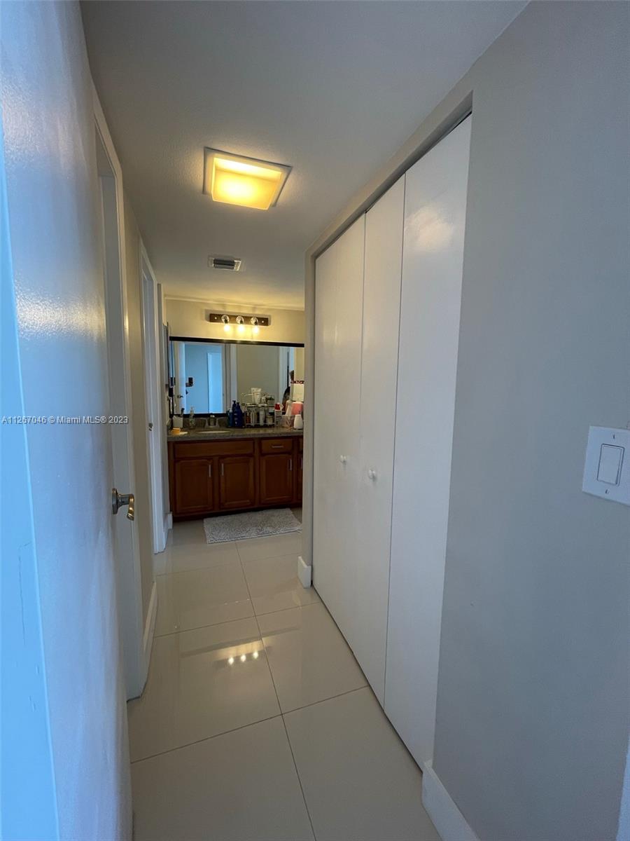 Master vanity area, walkin closet on the left and second closet on the right.