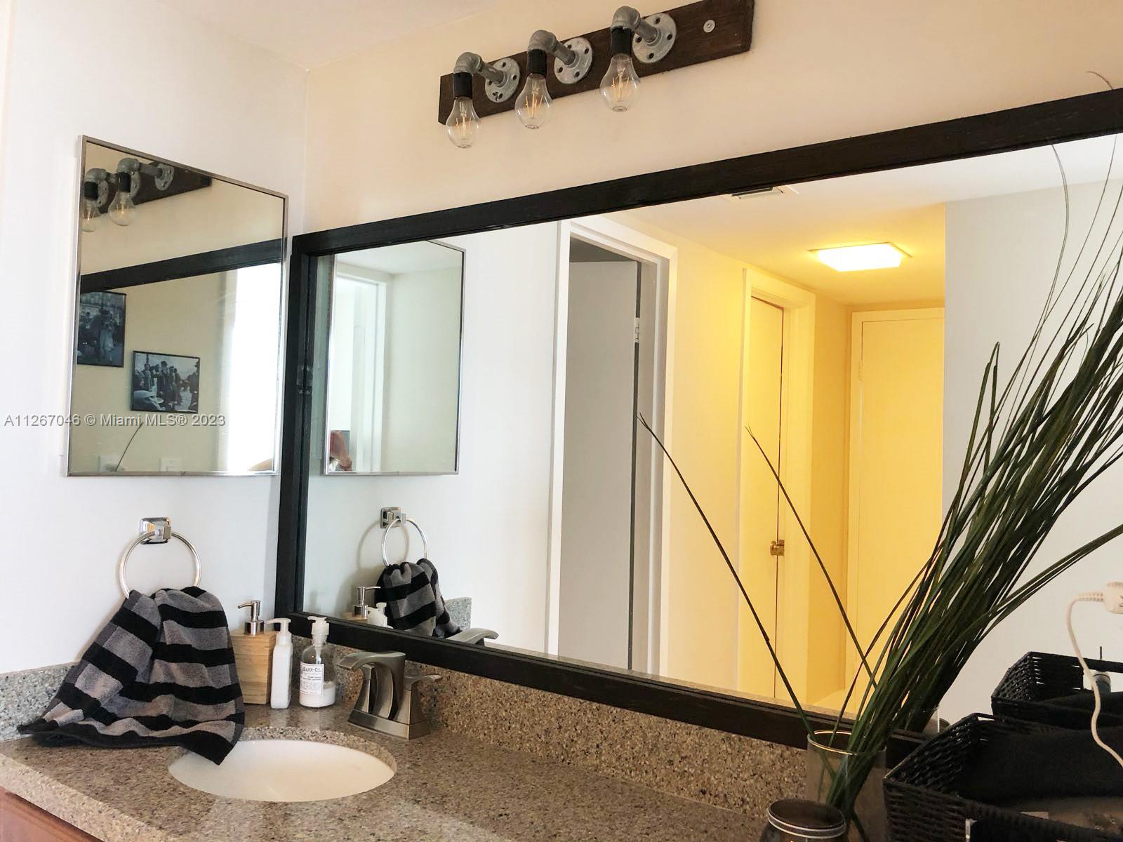 Ensuite Master Vanity area adjacent to master bathroom and Walk-in closet.