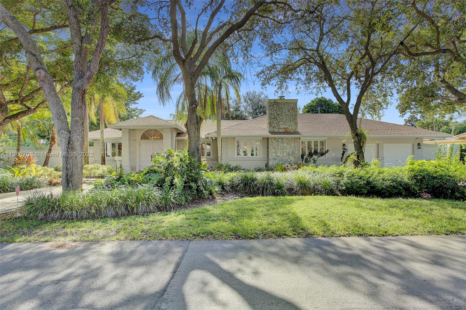 This beautiful Pinecrest home is a must see!!  It features a great floor plan with a formal foyer entry, spacious living and dining rooms, and volume ceilings.  A stunning new kitchen with a 10 ft long island and a breakfast area opens to the family room and french doors that lead to the pool, lush backyard, and a covered terrace - perfect for entertaining and lounging!! This fabulous home also includes an office, a laundry room, full 2 car garage, and a circular driveway.  Enjoy living close to excellent public and private schools, restaurants, shops, and parks.  Rent includes pool and garden maintenance.