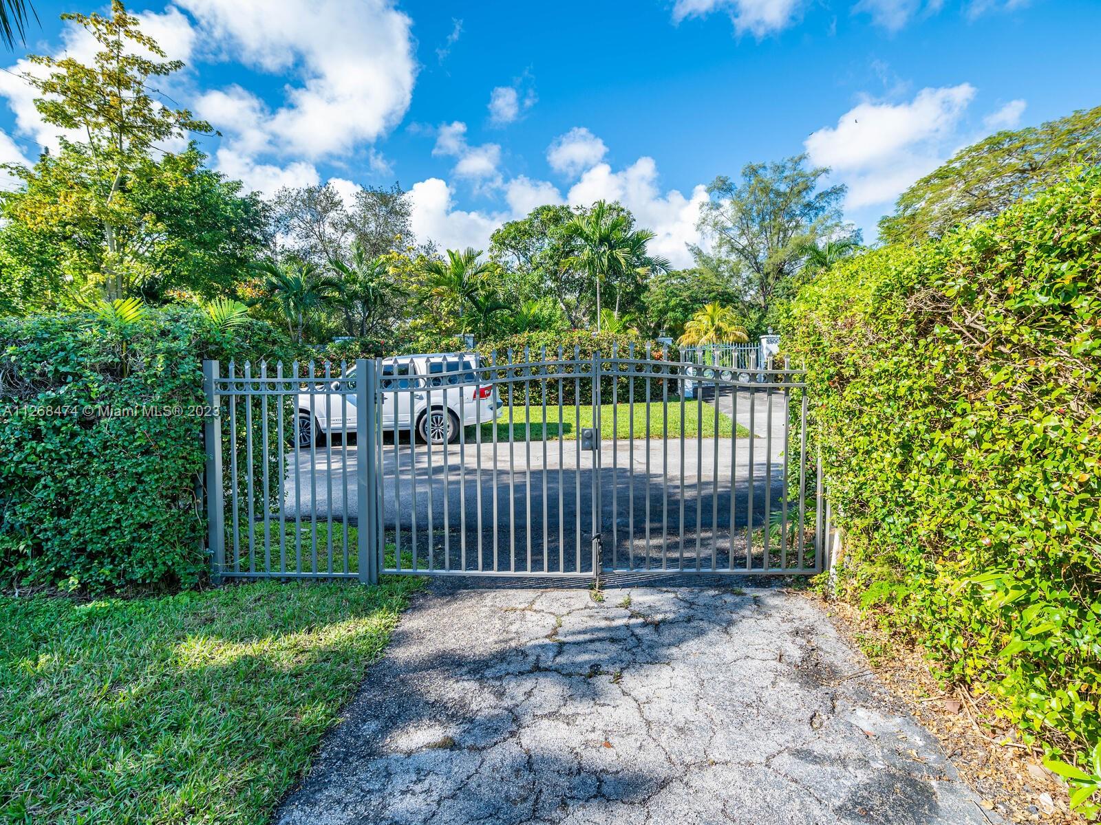 Side entry view with driveway