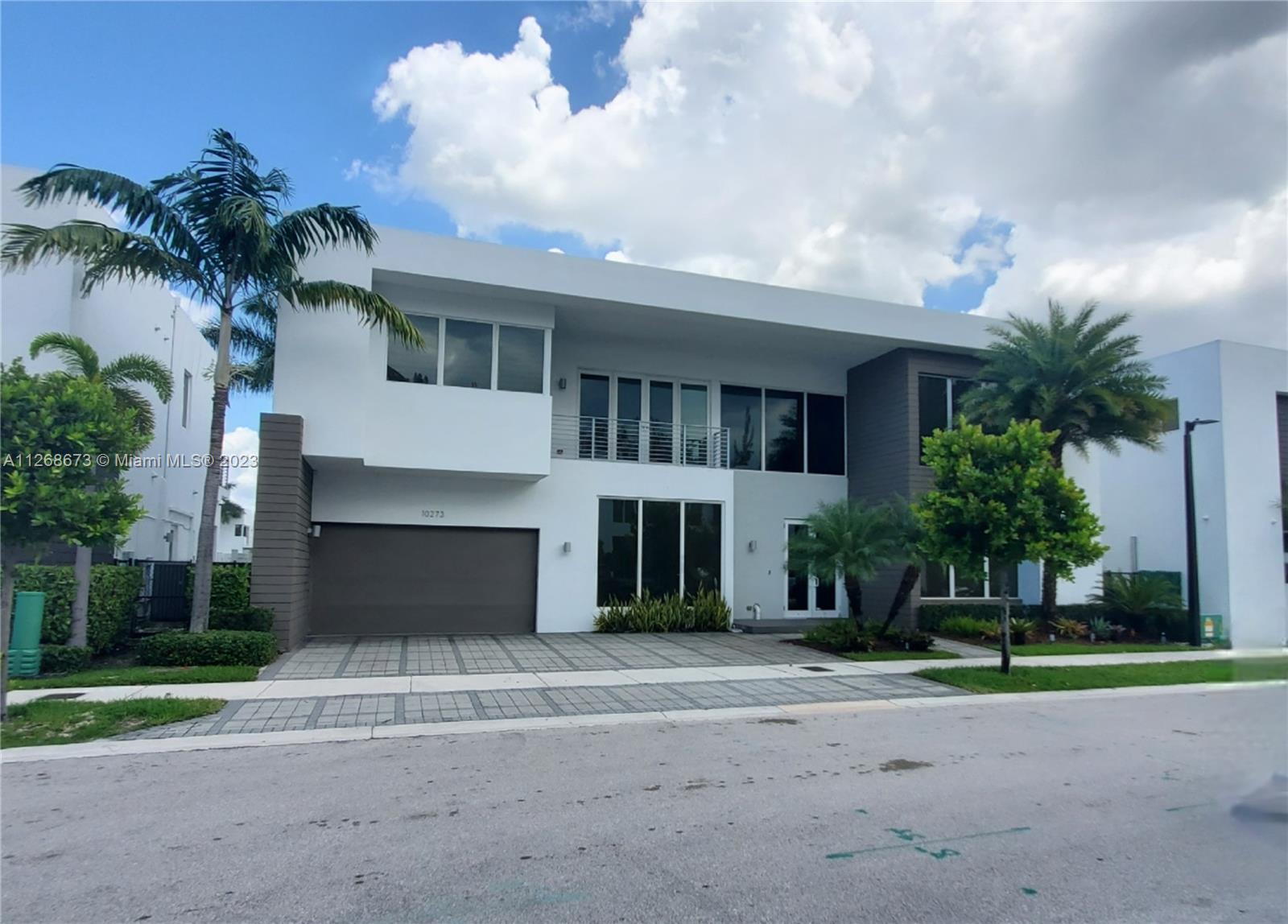 This property has no detail left behind. Modern design. Marble and wood floors, impact windows, kitchen cabinets and all doors designed by MIA CUCINA, subzero appliances, Creston smart home system, glass and steel staircase railing. The backyard has an amaizing oak pergola designed bu patio Design, built-in BBQ, sink, refrigerator and ice maker, marble floors and artificial grass, perfect  to enjoy with frieds and family. All bedroomswith bathrooms inside. 1 bedroom downstairs. The community has 24 hours security, clubhouse with exercise room, party room and pool.