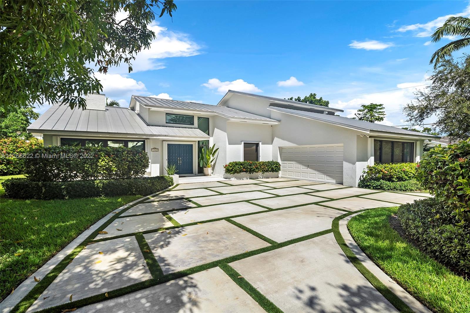 Rare opportunity to own an elegant, tastefully renovated property in the coveted guard gated Kings Bay community in S.Coral Gables. Upon entering this home one is greeted by a zen-like atrium garden that sets the mood for beauty and relaxation. The professionally designed interiors offer abundant natural light,volume high ceilings, formal living room w/ fireplace,2 dining rooms, family room,den and fabulous kitchen that opens to a covered terrace and a pristine saline pool. This exceptional home sits on a generous 15,800 SF lot with exotic tropical trees. The community offers a resident-only park and access to the Deering Bay marina with communal boat slips. Close proximity to nationally ranked schools, fine shopping and dining. Enjoy the S.FL lifestyle at its finest in this turnkey home.