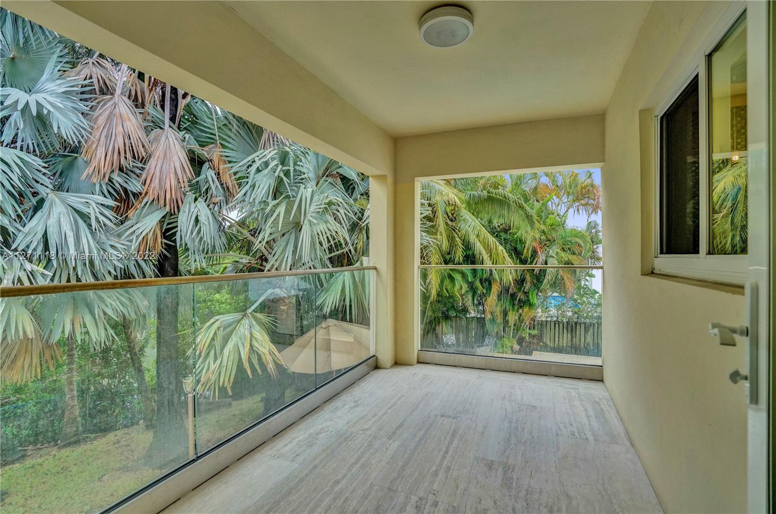 Marble Balcony from Master with Oleta River and Pool View