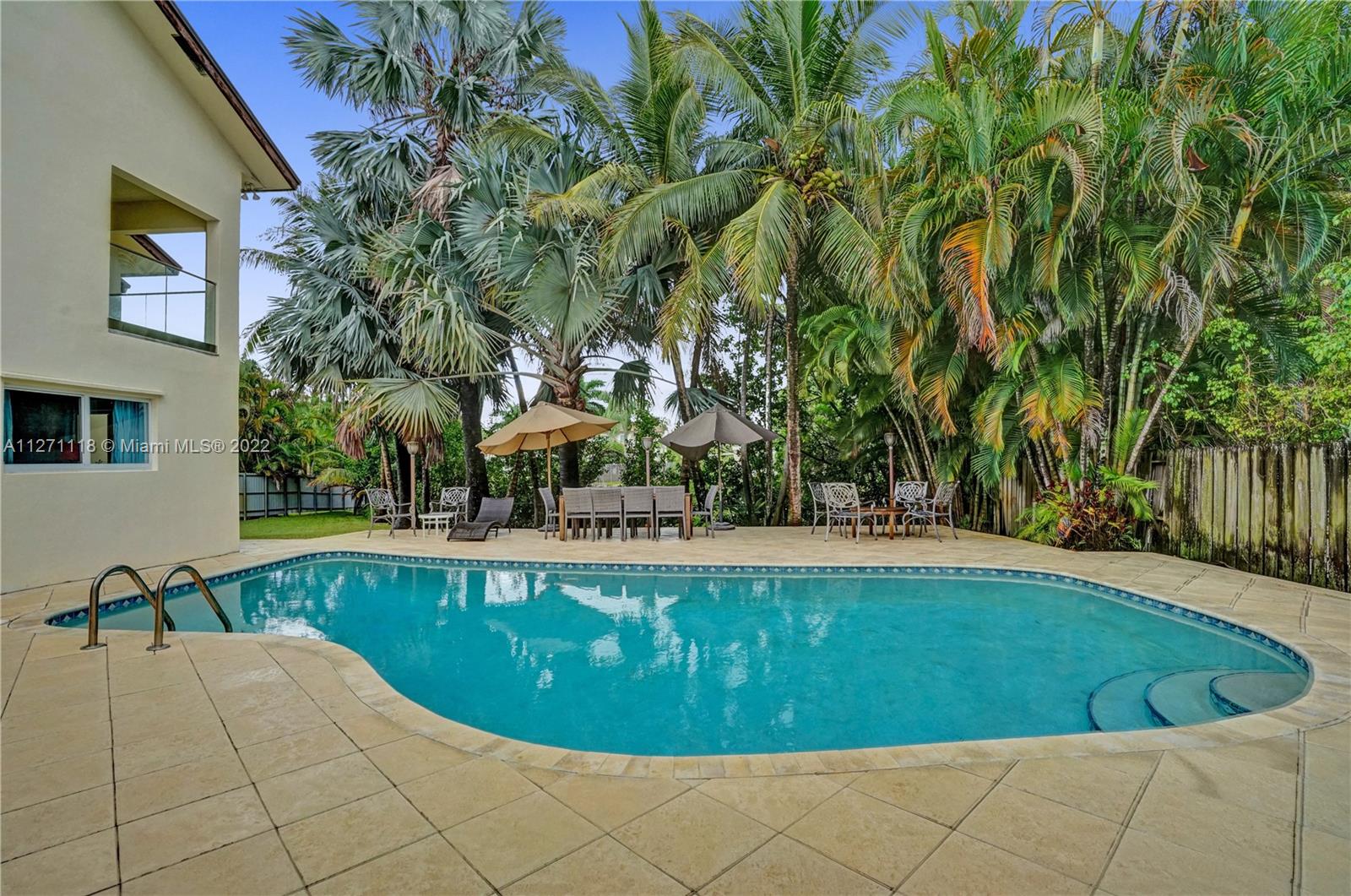 Tropical Palms and Pool Deck on the Oleta River