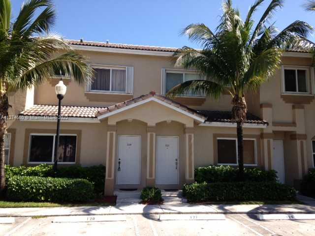 SPACIOUS & WELL MAINTAINED 2 BR/2.5 BA TOWN HOME IN GATED COMMUNITY OF TOWN GATE AT KEYS GATE. THIS POPULAR FLOORPLAN INCLUDES 2 MASTER SUITES W/ LAUNDRY ROOM UPSTAIRS. LAMINATE FLOORING ON 1ST FLOOR AND NEWER CARPET UPSTAIRS.  FENCED IN PATIO THAT OPENS TO POOL PARK AREA. GREAT LOCATION! RENT INCLUDES: ATT UVERSE BASIC CABLE & INTERNET, ALARM, TRASH, PEST CONTROL, SECURITY & COMM POOL. NO PETS