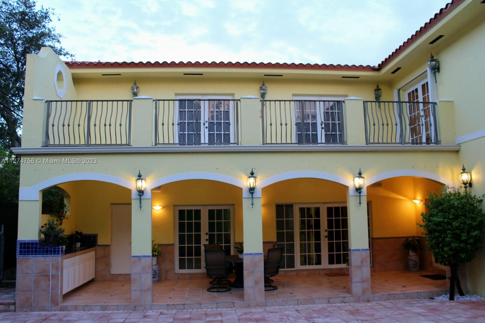 Twilight View Lower Terrace and Outside Kitchen and Upper Terraces
