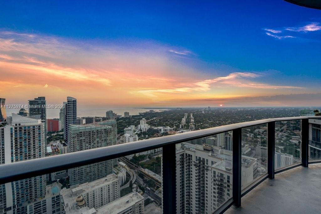 REDUCED and motivated seller!! Stunning penthouse located in the heart of Brickell. This breathtaking unit has 4 bedrooms, 4.5 bathrooms & 2 parking spaces assigned. The living space has high ceilings, remote shades, dramatic floor-to-ceiling high-impact glass windows, and porcelain floors. The gourmet open kitchen with top-of-the-line appliances has a magnificent East, South & West exposure to the ocean & Miami skyline view with a wrap-around balcony. Amazing amenities feature a rooftop pool, entertainment rooms, screening room, sauna, steam room, kid's club, business center & the world-famous Equinox Fitness Center.  Also for rent CLICK ON VIRTUALTOUR!