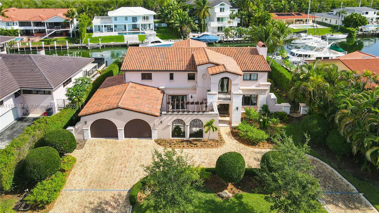 Florida waterfront living at its finest with Seller Financing available. Gorgeous Gables by the Sea 5BD 4.5BA estate fully renovated in 2008 offers 100' direct ocean access to Biscayne Bay. Expert craftsmanship and elegant features include 24" marble & solid wood floors, designer cabinetry, floating staircase & marble fireplace. Elevator. Stylish white quartz & solid espresso wood kitchen. Heated pool/spa & summer kitchen, cabana guest bdrm. Primary bdrm features custom closets, spa bath, sitting room & covered terrace. 2-car gar, generator, full impact glass. Coral Gables finest guard gated community includes top rated schools, community park and pedestrian friendly tree-lined streets.