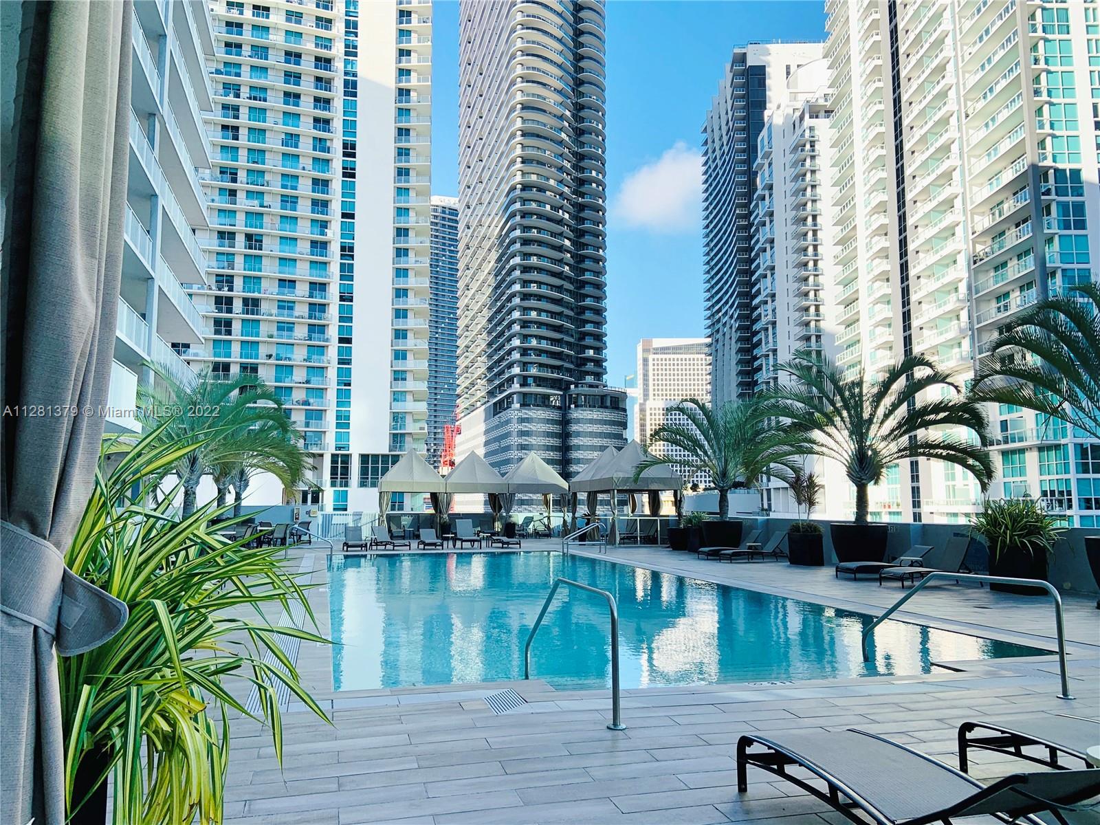 Nicely Furnished or Unfurnished , this one bedroom one and a half baths apartment at The Vue at Brickell has it all: Preferred east side view, high ceilings, top floor in the 08 line, spacious floor plan, walk-in closet, remodeled open kitchen to the living/dining area, granite countertops in kitchen and both bathrooms, tile and wood floors (no carpet!!!!), full size washer and dryer and fast Google Fiber Web pass Internet included.
Best location on Brickell area to walk to all area restaurants, Brickell City Center and Brickell Financial District.
 It won't last !!