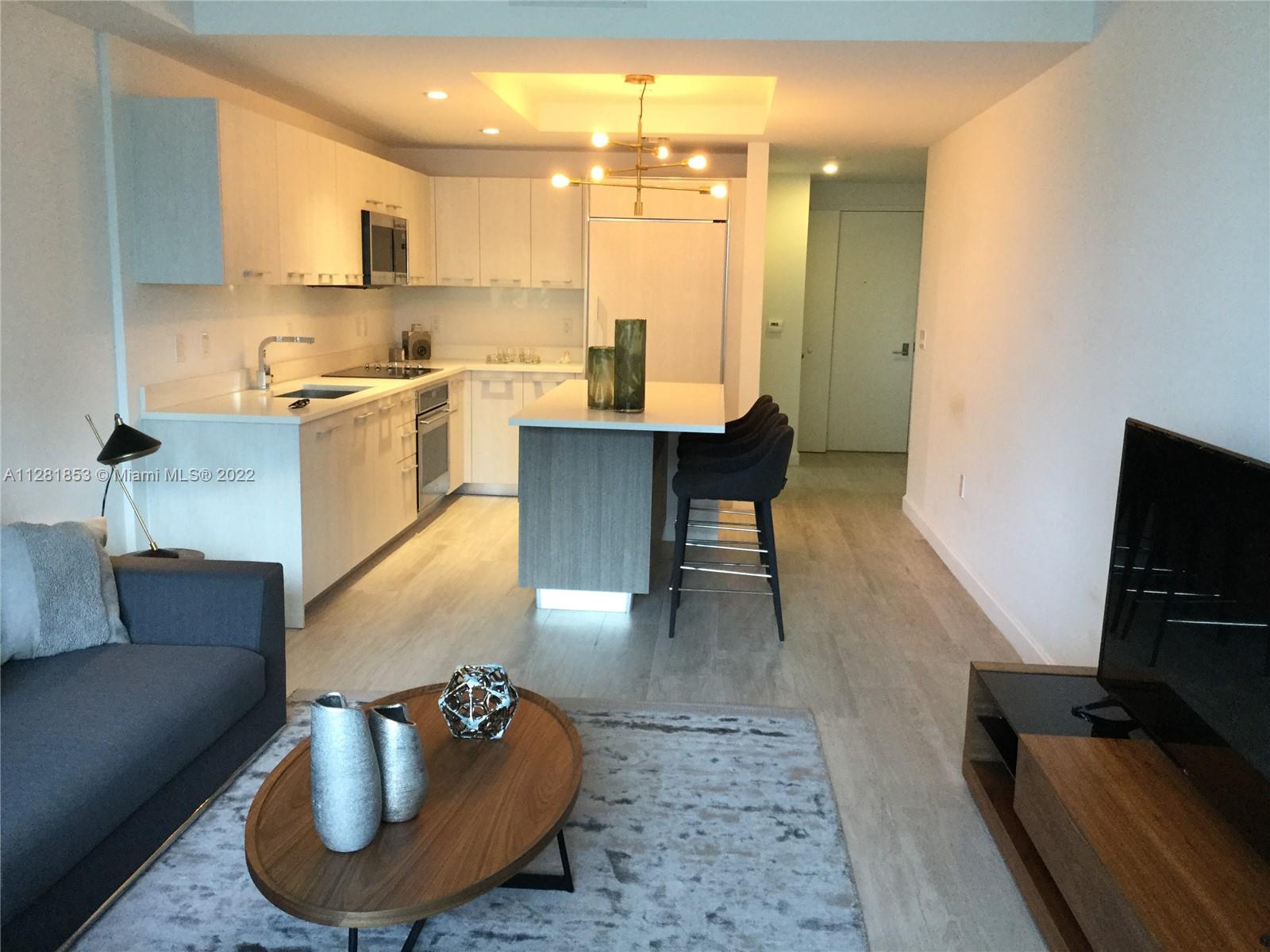 Completely furnished unit at Brickell. Professionally decorated. 1 bedroom / 2 full bathrooms / den converted into second bedroom with sofa bed. Wood like porcelain flooring. Large terrace with great views from Brickell skyline. Washer and dryer. Amenities included 9th floor pool, 2 party rooms, kids room, theater, full gym, & spa, 24hr security & rooftop pool.