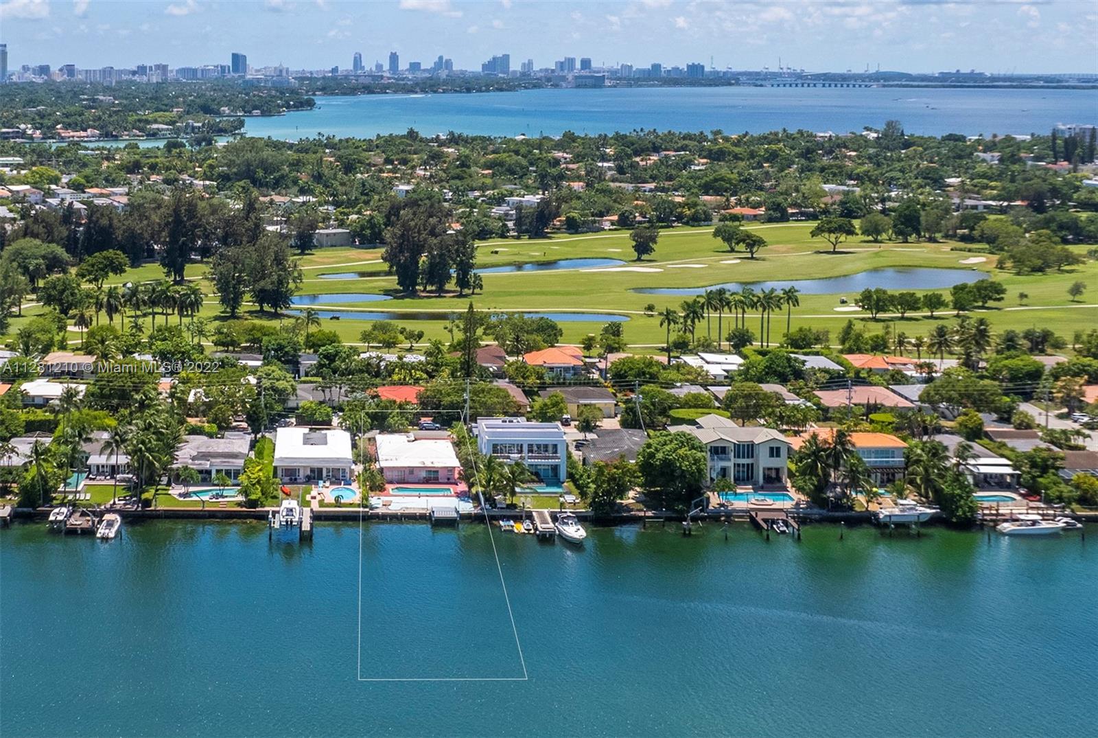 Build your waterfront dream home in the exclusive golf-gated community of Normandy Shores. Located just 15’ from Bal Harbour, South Beach & Wynwood, this location has become one of the most desirable waterfront luxury living spots in Miami Beach. 10,200 SQFT lot w/ breathtaking water views & 60 ft of water frontage can accommodate a 5,000 SQFT, 2 story residence, w/5 bed, 5 bath, chef kitchen, family/media rooms, 2 car garage & more. Enjoy your private pool, secluded garden, summer kitchen & boat dock. LUXURY WATERFRONT LIVING AT ITS BEST. Rent the existing 2,394 SQFT, 3B/2B home while you create your masterpiece. PROJECT, ARCHITECTURAL PLANS & PERMITS ARE NOT INCLUDED. Renders are courtesy of H2 Construction, a Design, Build and Development firm with multiple developments in Normandy.