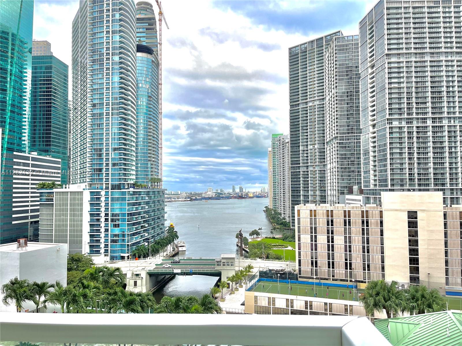 Amazing 2 Bedrooms / 2Bathrooms unit in the Heart of Brickell, one of the coolest most energetic  neighborhoods in the World. This gorgeous unit offers stunning views of the Bay, City and Miami River. 1,051 SQFT, wood floors, modern kitchen with granite countertops. Brand new refrigerator and A/C. Split bedroom layout offers space and privacy. Resort style amenities including Spa, State-of-the art fitness center, business center, pool BBQ. Steps from Brickell City Centre, restaurants, wholefoods and more! Just minutes from Metro Mover station.
